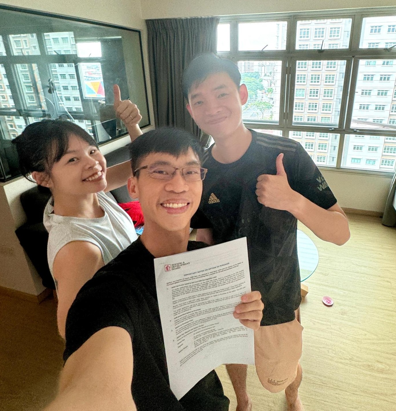 Wilfred with a first-time buyer, Riverfront Residences